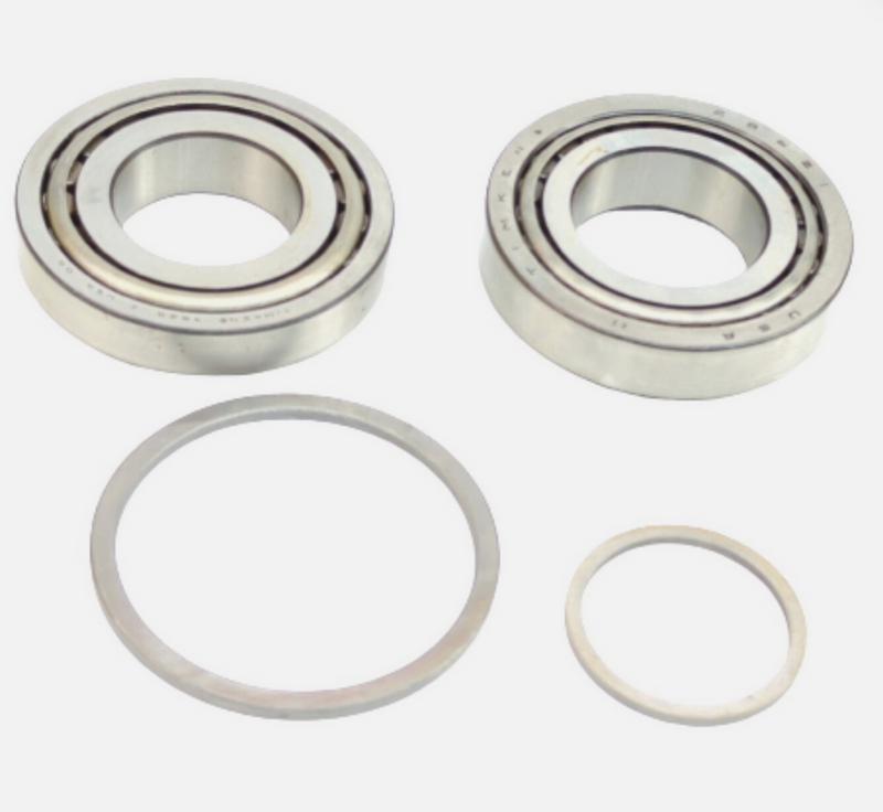 Two bearings and two washers on a white background
